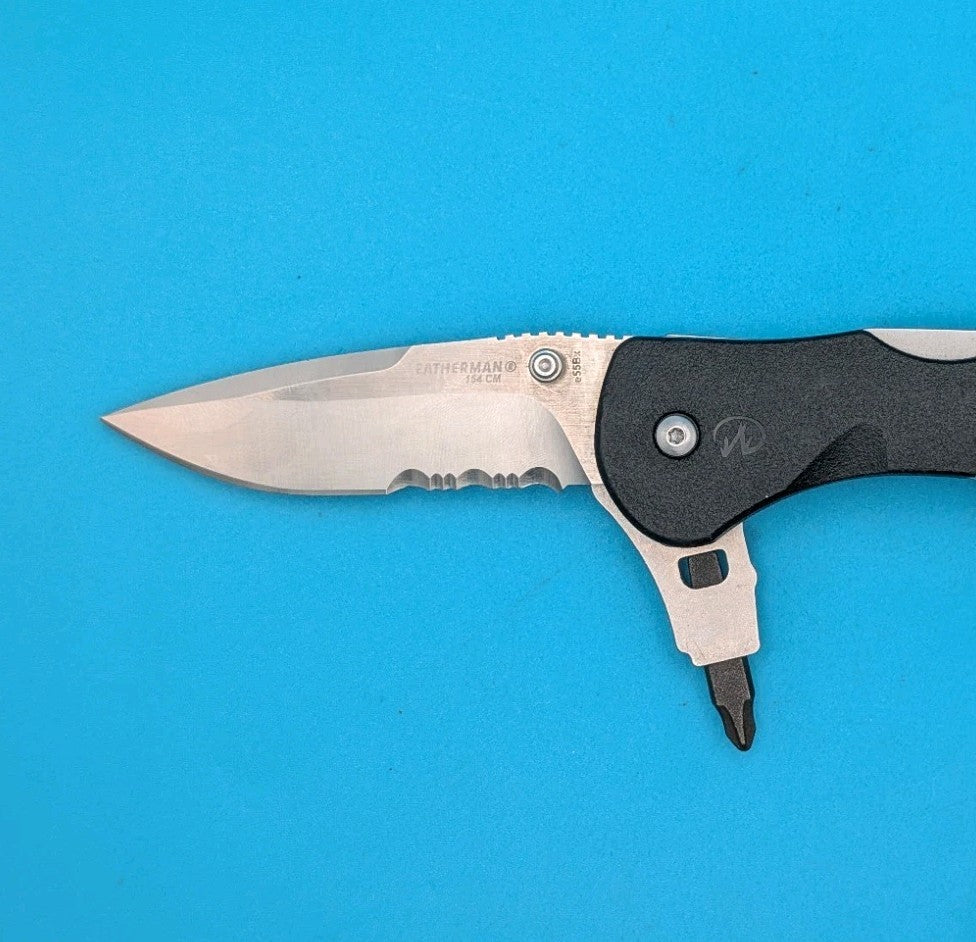 Retired Leatherman E55BX 154CM Blade Combo Edge Folding Pocket Knife!