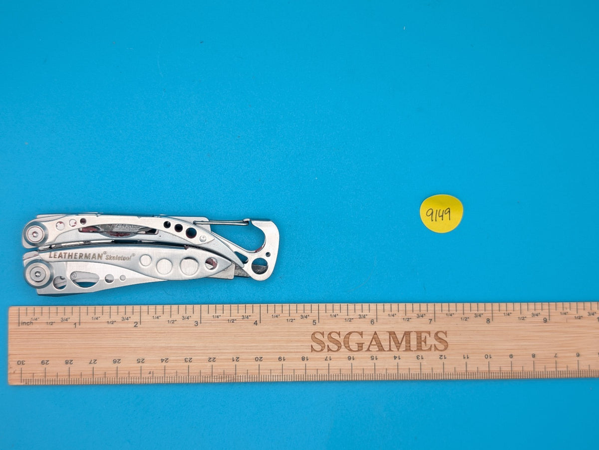 LEATHERMAN Skeletool Multi Tool - Combo Edge Blade Knife Pliers Carabiner!!!