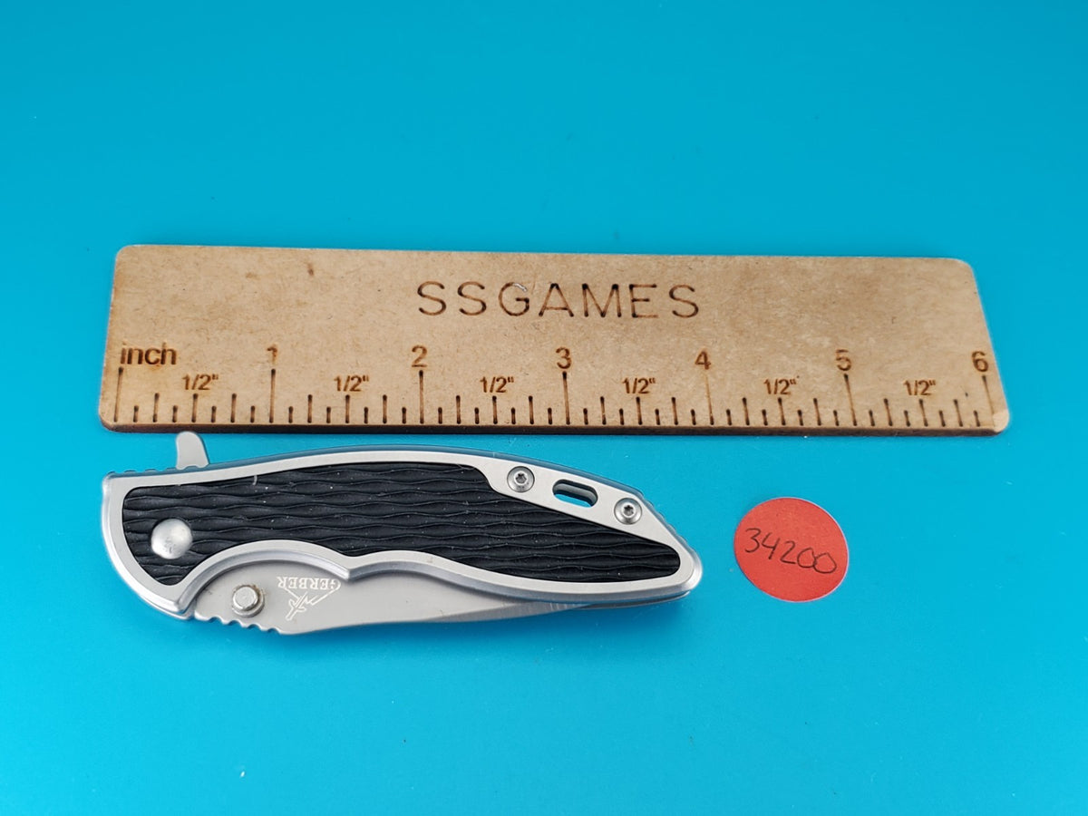 Gerber Torch I Frame Lock Plain Edge Blade Folding Pocket Knife!