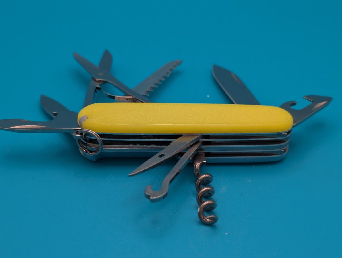 Custom Victorinox Huntsman Blue & Yellow Glow in the Dark Swiss Army Knife!