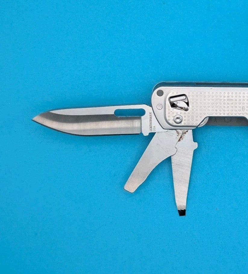 Leatherman FREE T4 Pocket Knife Multi-tool! Stainless! RETIRED!