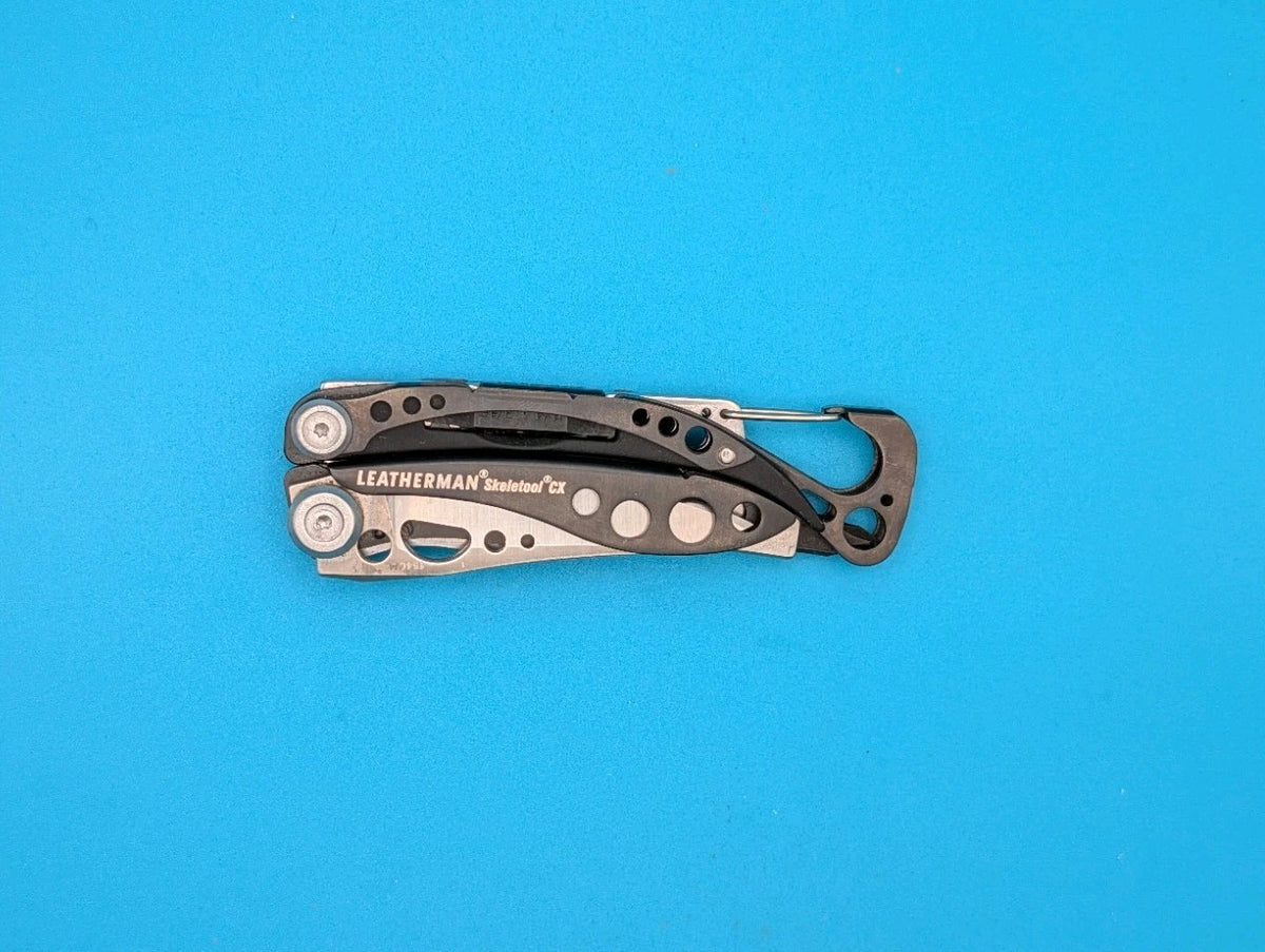 Leatherman Skeletool CX Multitool Plain Edge Knife! WITH SHEATH!