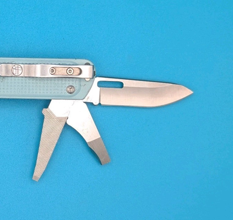 Leatherman FREE T4 Pocket Knife Multi-tool! Teal! RETIRED!