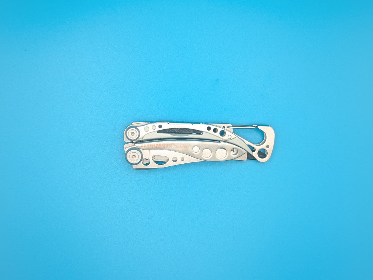 LEATHERMAN Skeletool Multi Tool - Combo Edge Blade Knife Pliers Carabiner!