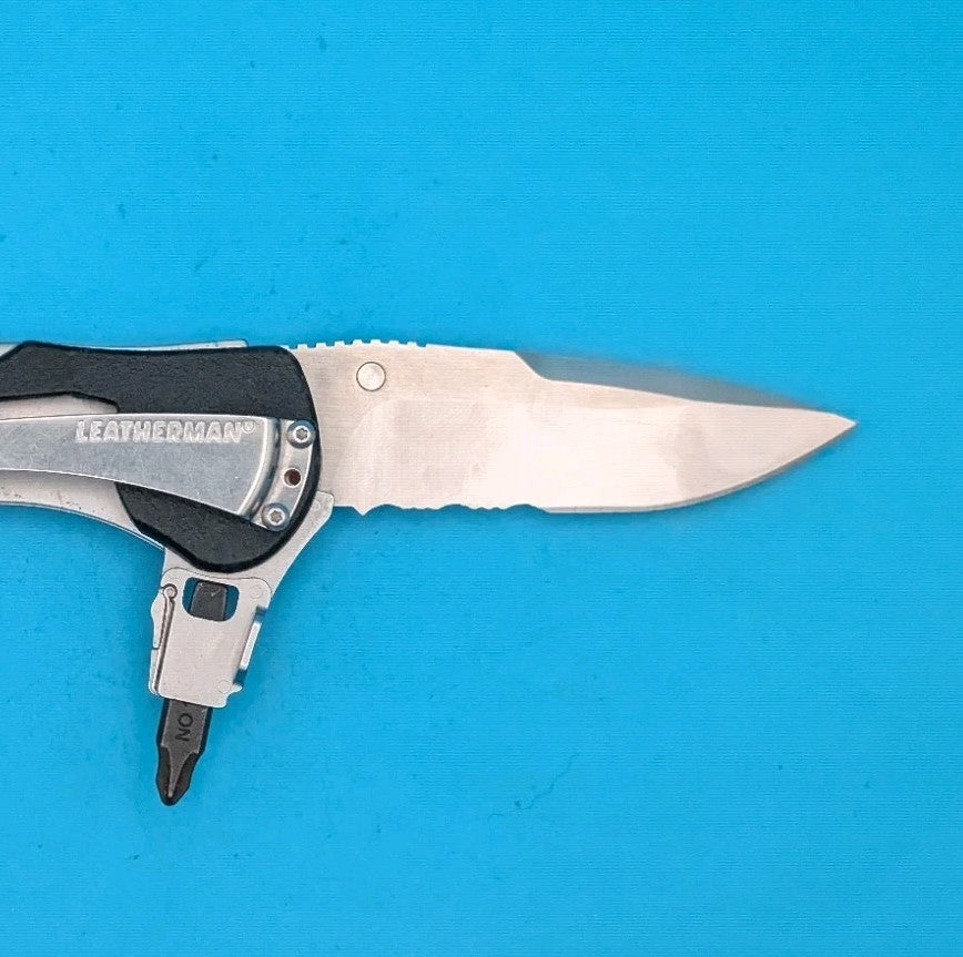 Retired Leatherman E55BX 154CM Blade Combo Edge Folding Pocket Knife!