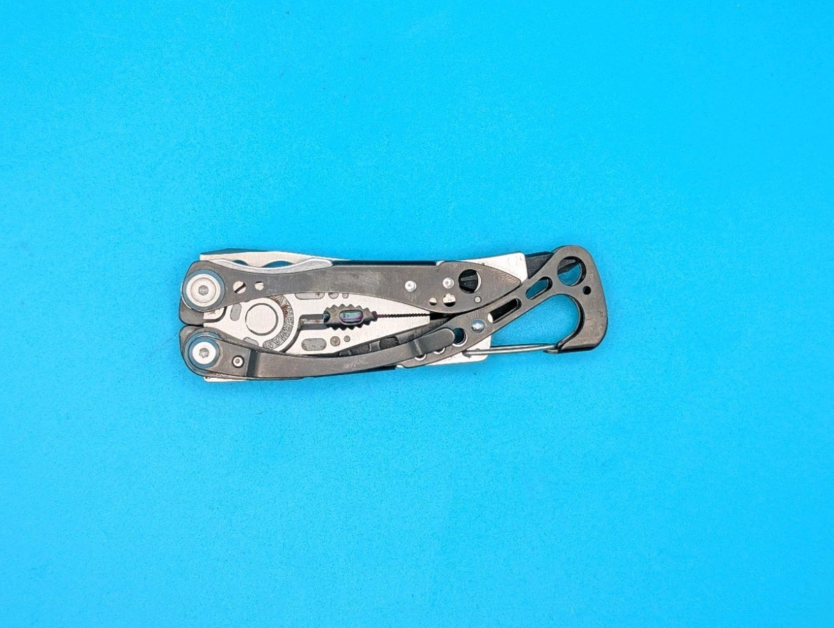 Leatherman Skeletool CX Multitool Plain Edge Knife!