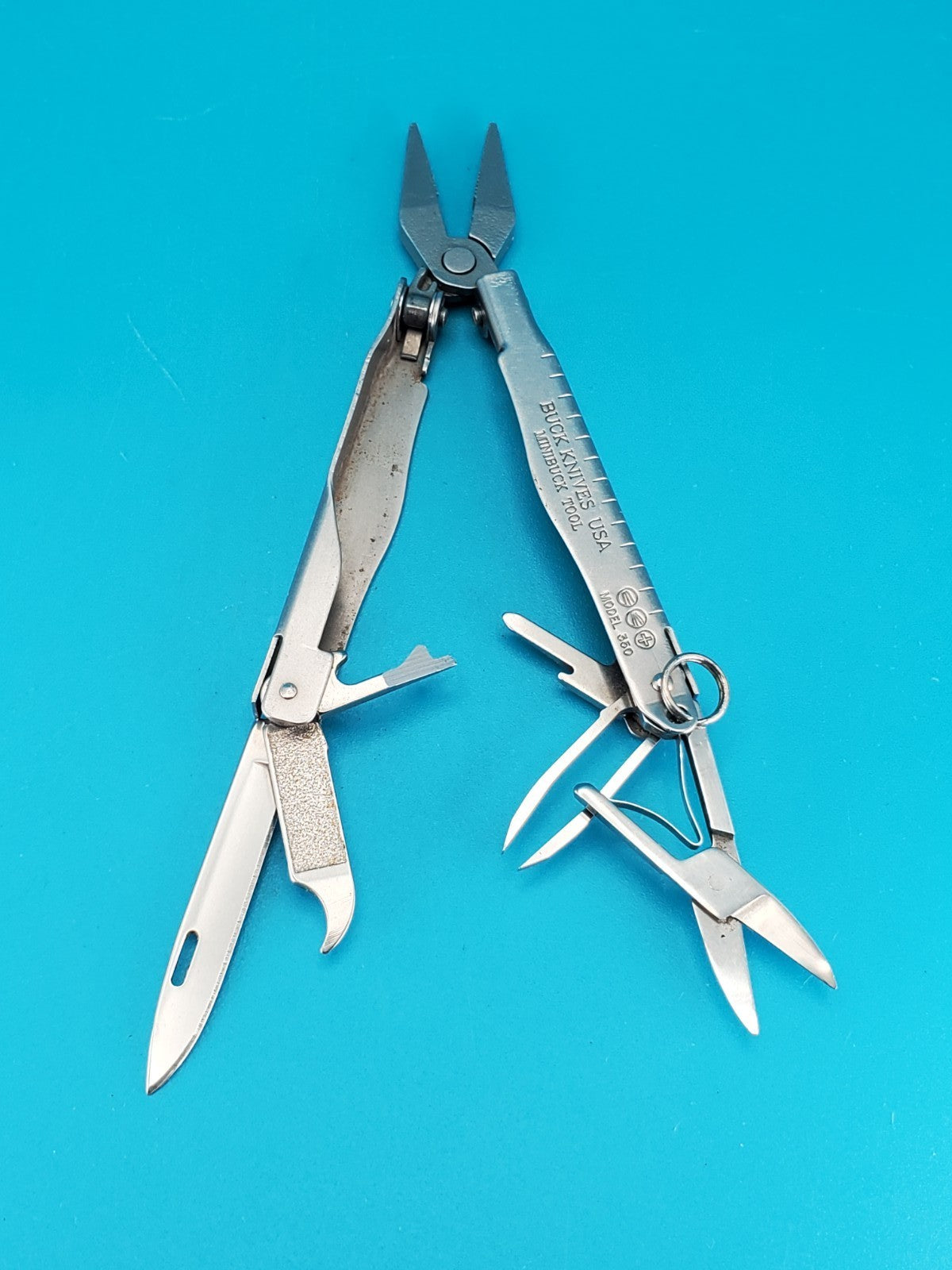 BUCK USA BUCK MINI BUCK MULTI TOOL 350! RETIRED COLLECTIBLE! WITH SHEATH!