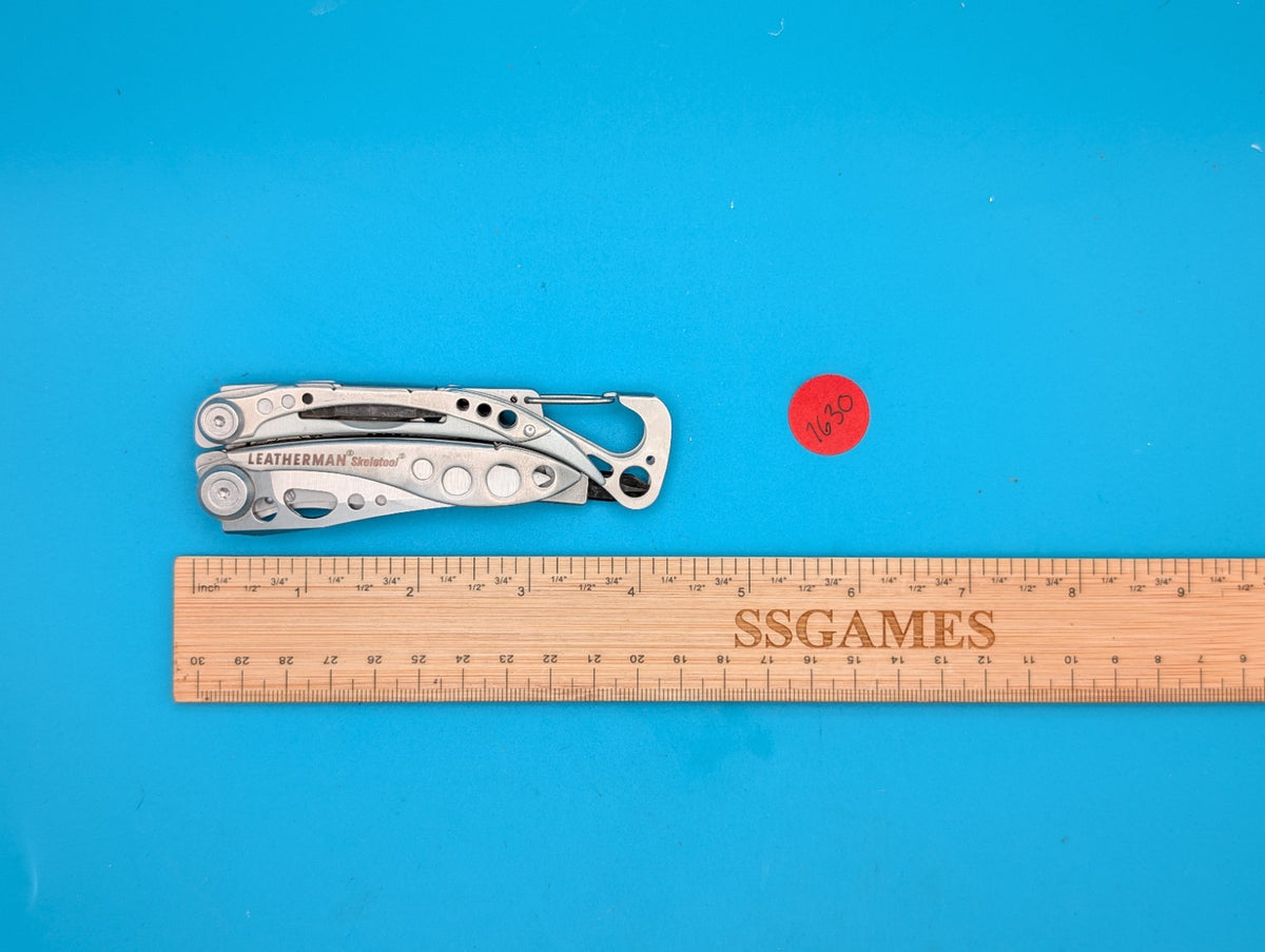LEATHERMAN Skeletool Multi Tool - Combo Edge Blade Knife Pliers Carabiner!!!