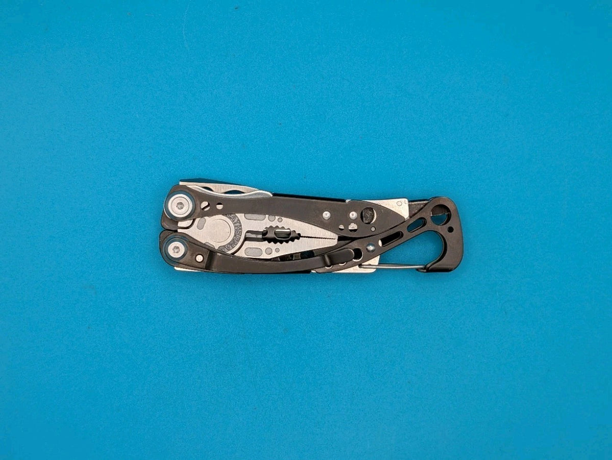 Leatherman Skeletool CX Multitool Plain Edge Knife!