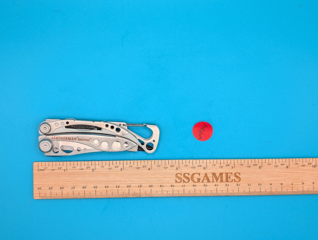 LEATHERMAN Skeletool Multi Tool - Combo Edge Blade Knife Pliers Carabiner!!!