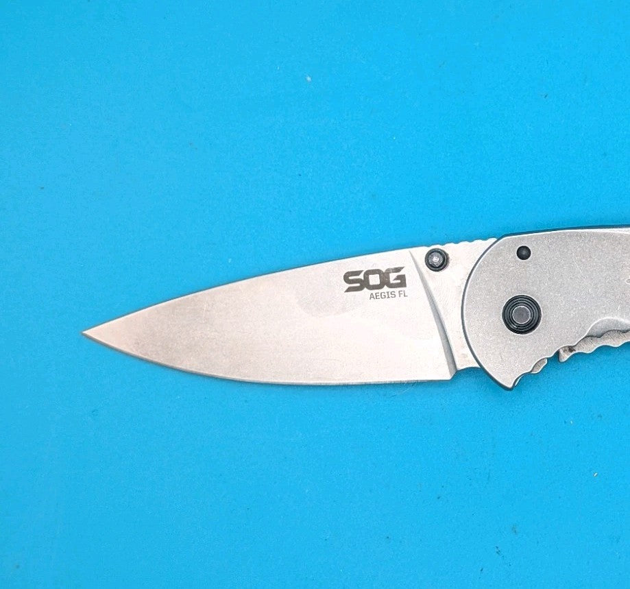 SOG Aegis FL Flipper Knife Frame Lock Plain Edge Blade!