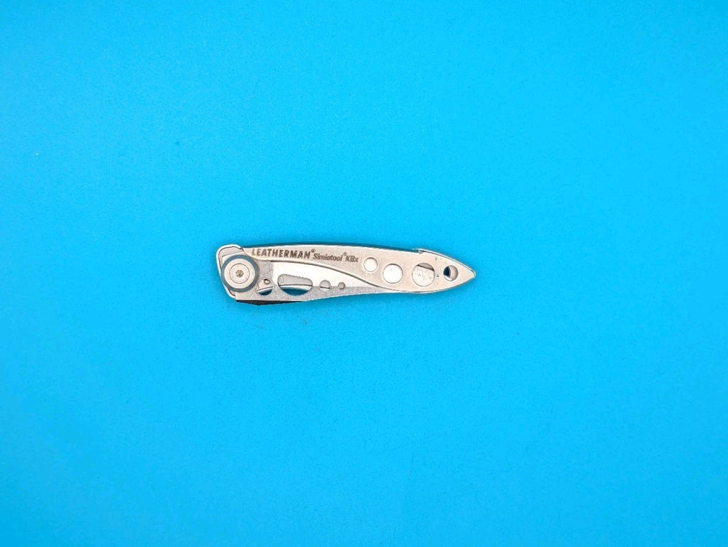 Leatherman Skeletool KBX Pocket Knife w/ Bottle Opener, SILVER!