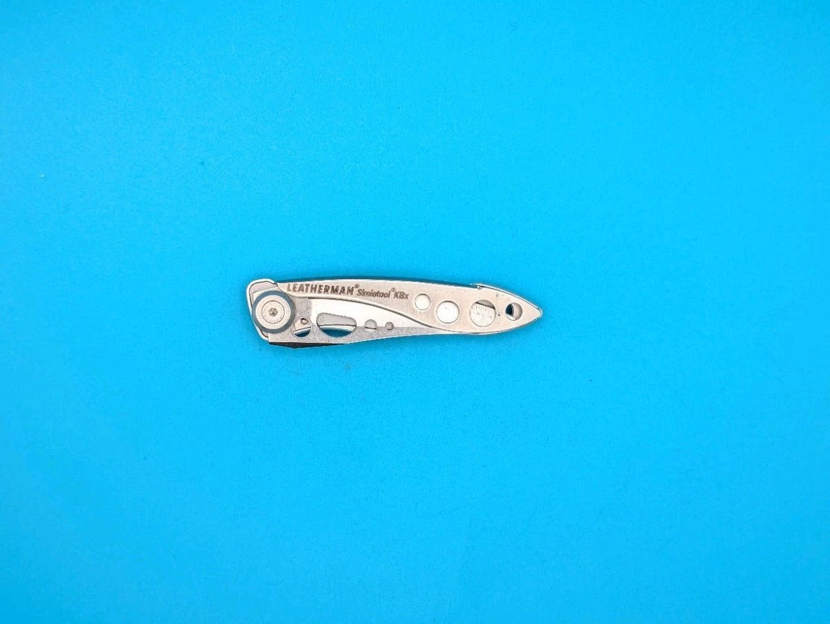 Leatherman Skeletool KBX Pocket Knife w/ Bottle Opener, SILVER!