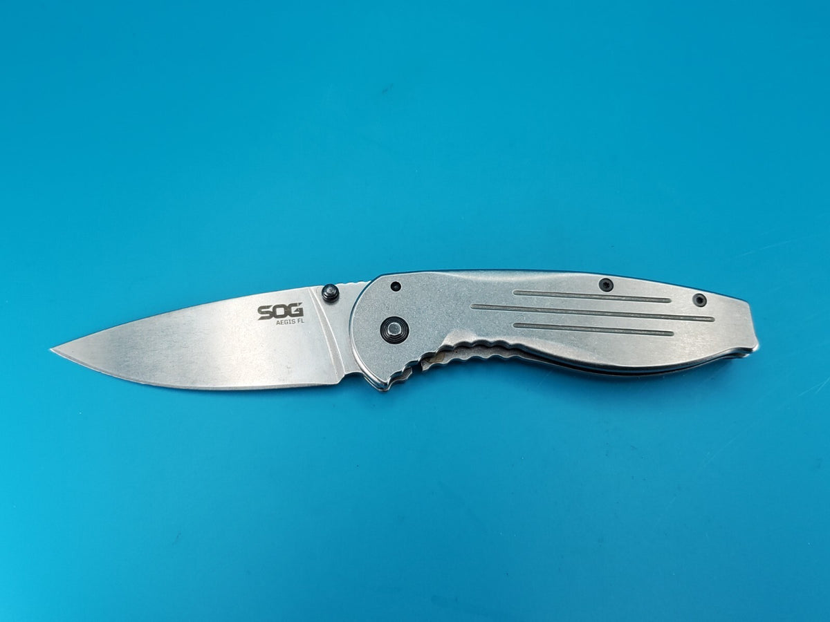 SOG Aegis FL Flipper Knife Frame Lock Plain Edge Blade!