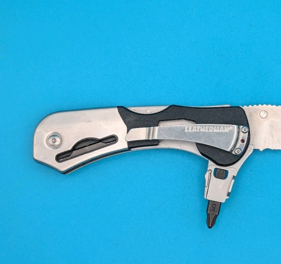 Retired Leatherman E55BX 154CM Blade Combo Edge Folding Pocket Knife!