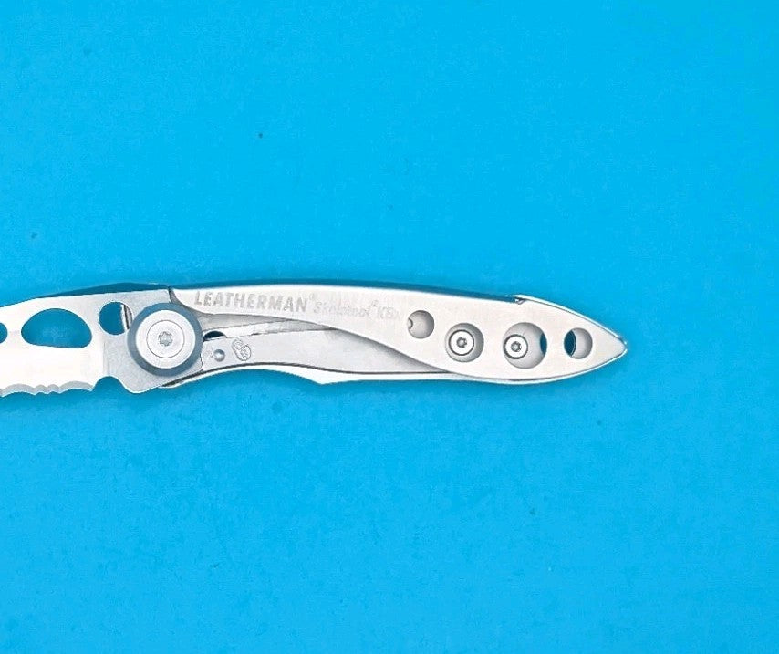 Leatherman Skeletool KBX Pocket Knife w/ Bottle Opener, SILVER!