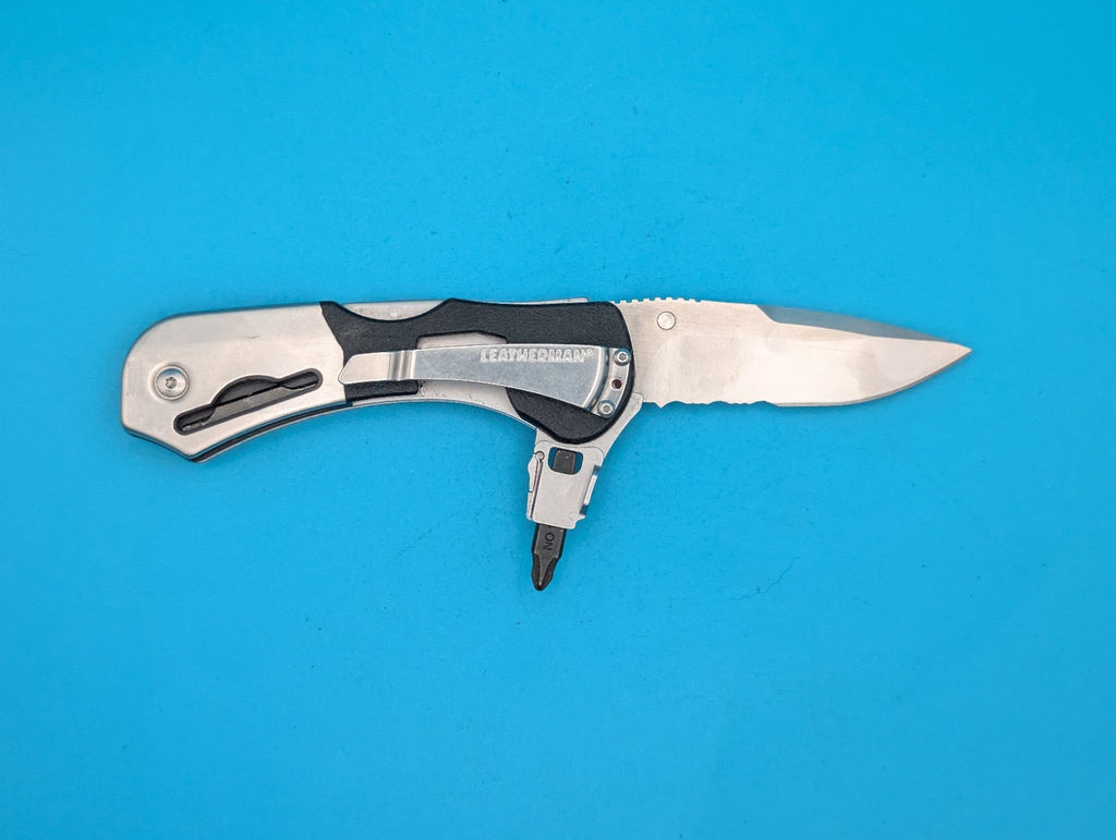 Retired Leatherman E55BX 154CM Blade Combo Edge Folding Pocket Knife!