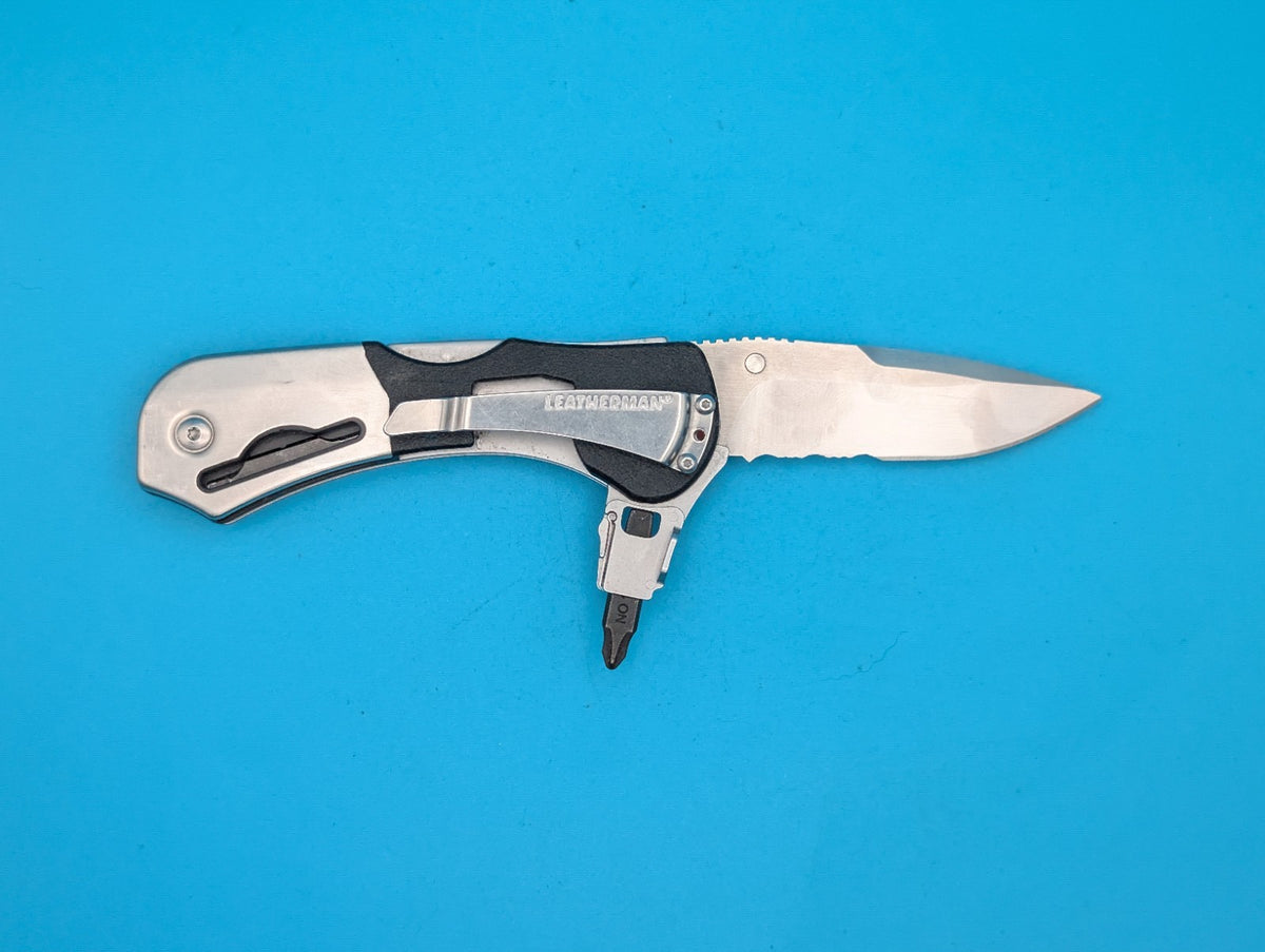 Retired Leatherman E55BX 154CM Blade Combo Edge Folding Pocket Knife!