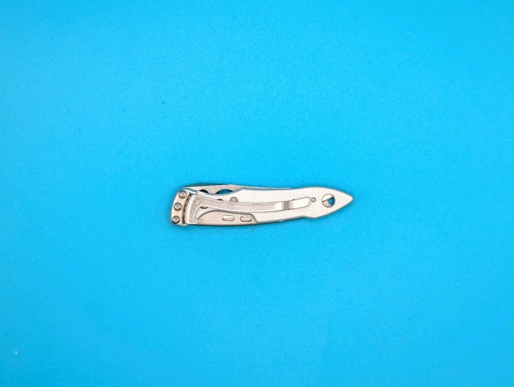 Leatherman Skeletool KBX Pocket Knife w/ Bottle Opener, SILVER!
