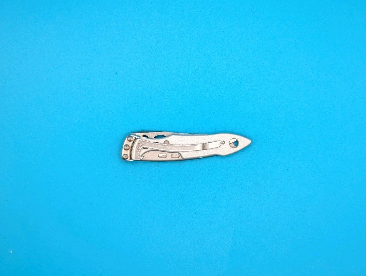Leatherman Skeletool KBX Pocket Knife w/ Bottle Opener, SILVER!