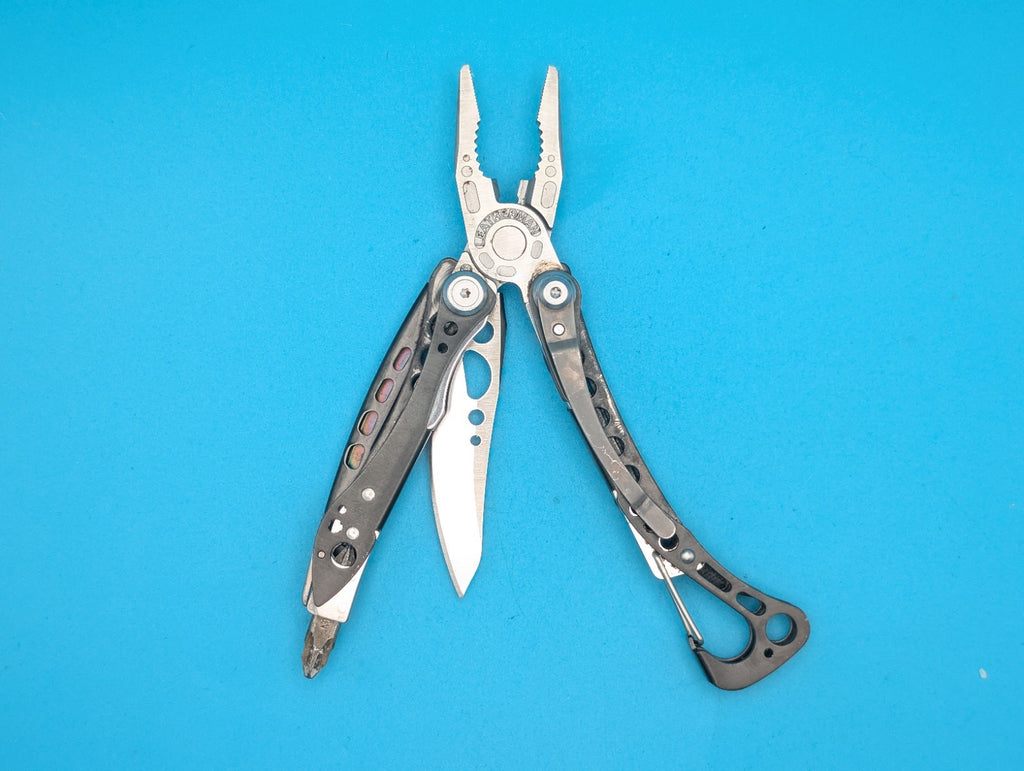 Leatherman Skeletool CX Multitool Plain Edge Knife!