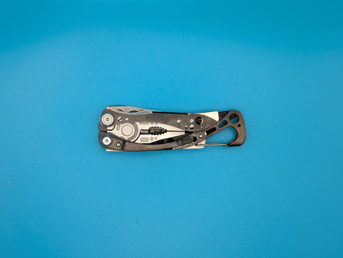 Leatherman Skeletool CX Multitool Plain Edge Knife!