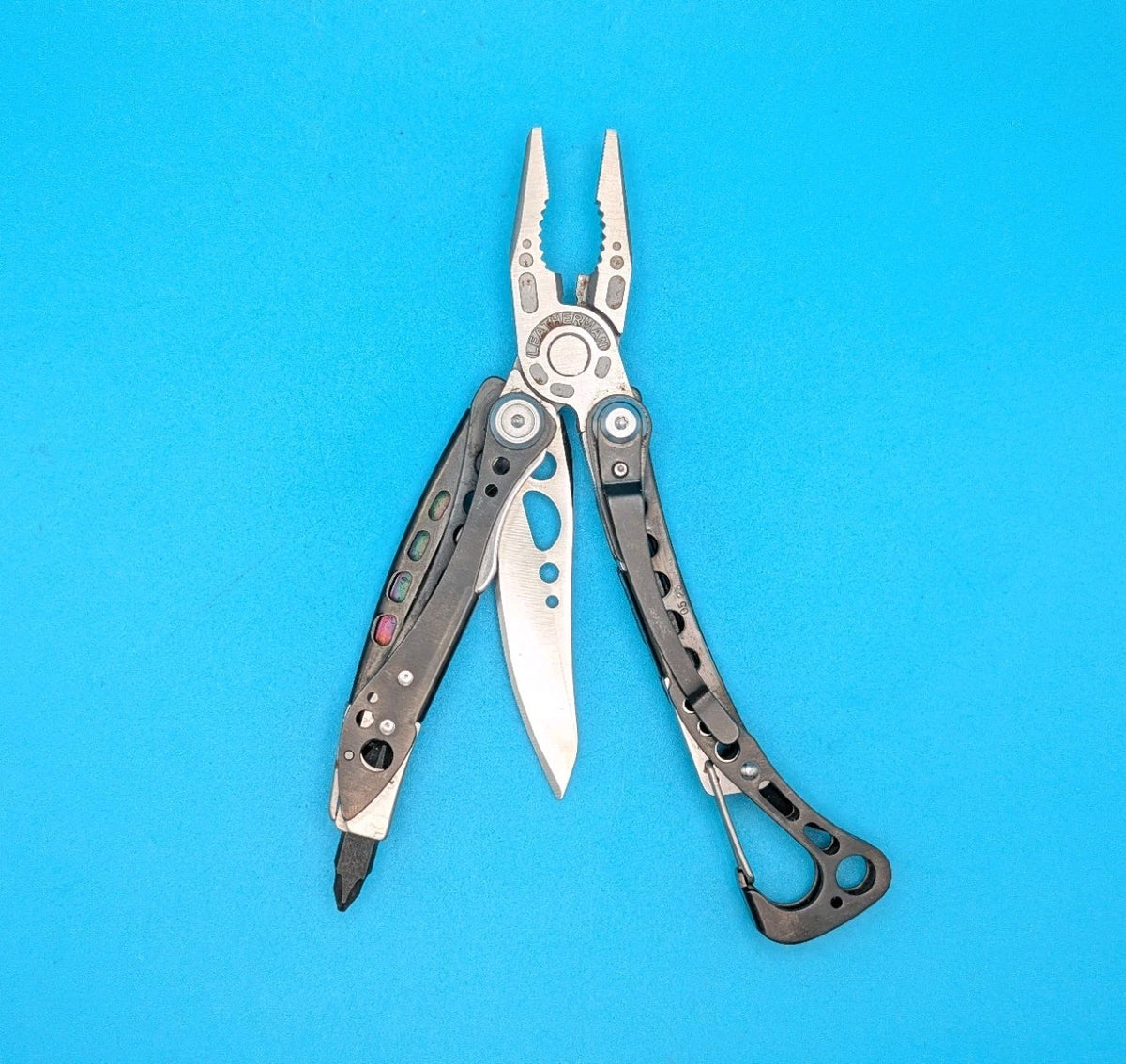 Leatherman Skeletool CX Multitool Plain Edge Knife!