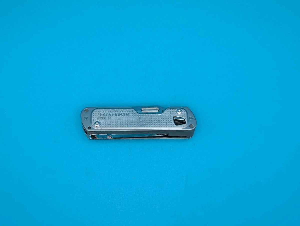 Leatherman FREE T4 Pocket Knife Multi-tool! Stainless! RETIRED!