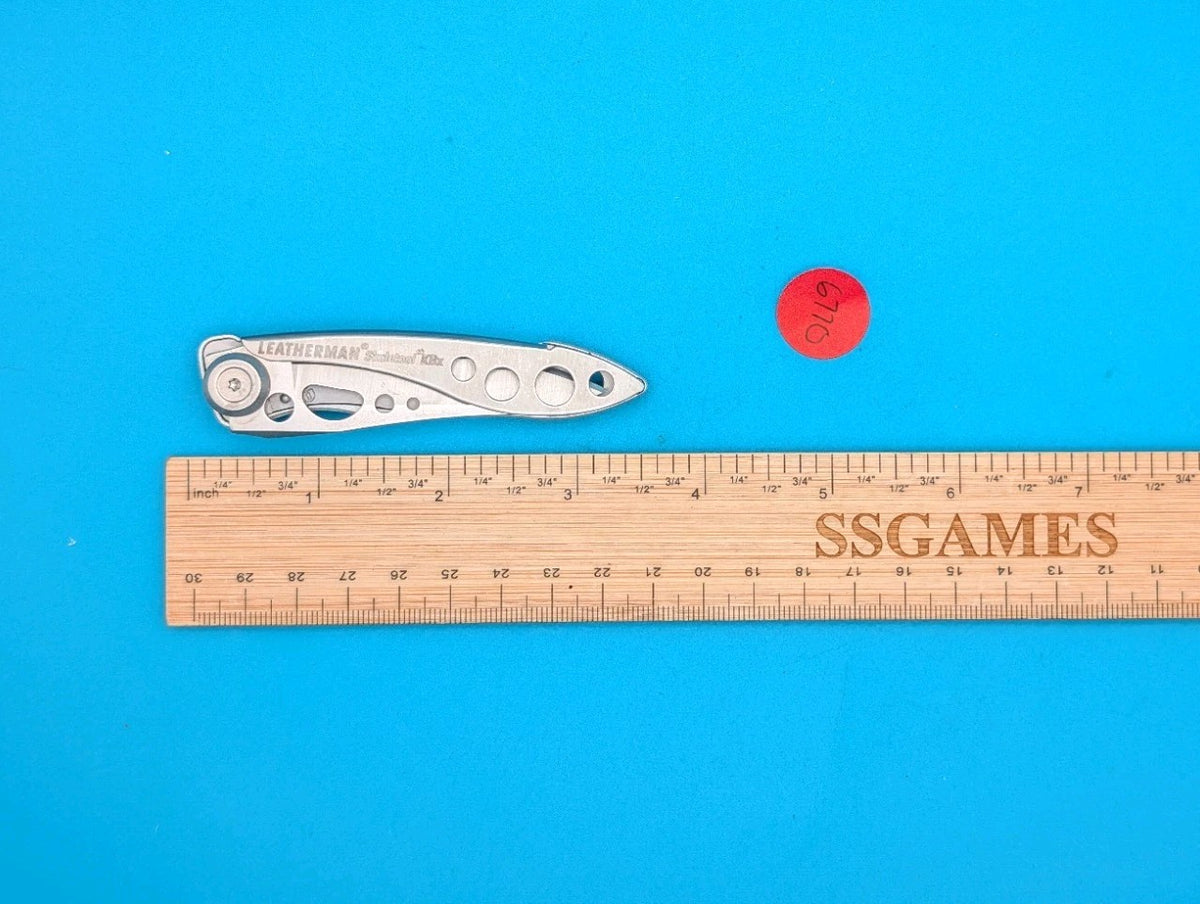 Leatherman Skeletool KBX Pocket Knife w/ Bottle Opener, SILVER!