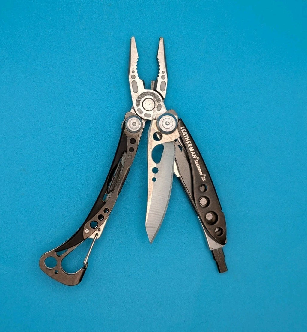 Leatherman Skeletool CX Multitool Plain Edge Knife!