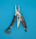 Leatherman Skeletool CX Multitool Plain Edge Knife!