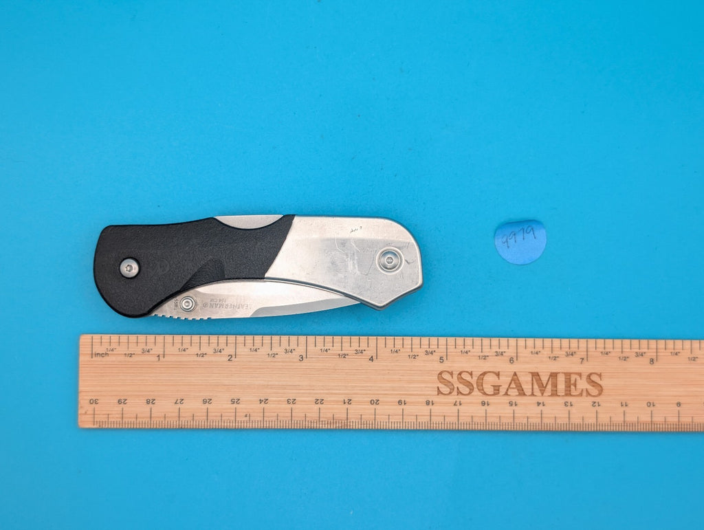 Retired Leatherman E55BX 154CM Blade Combo Edge Folding Pocket Knife!