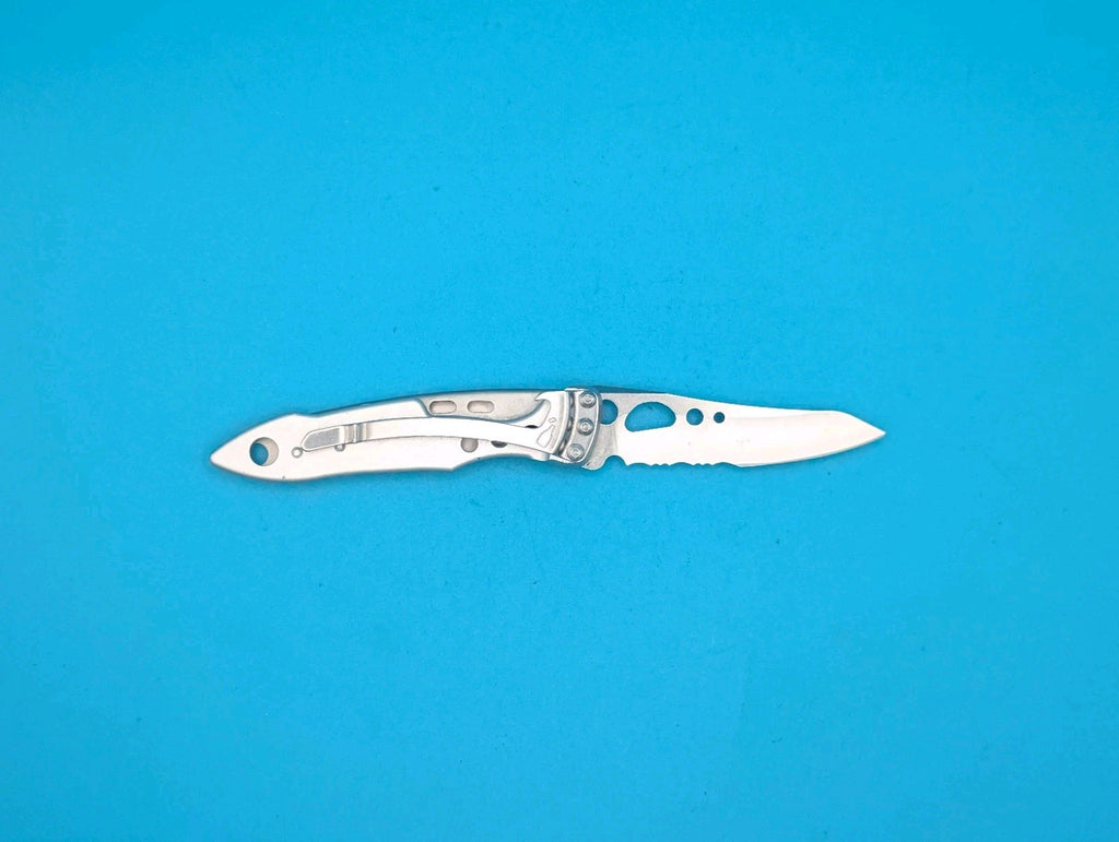 Leatherman Skeletool KBX Pocket Knife w/ Bottle Opener, SILVER!