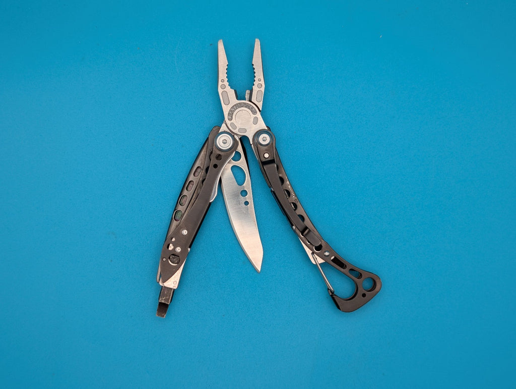 Leatherman Skeletool CX Multitool Plain Edge Knife!