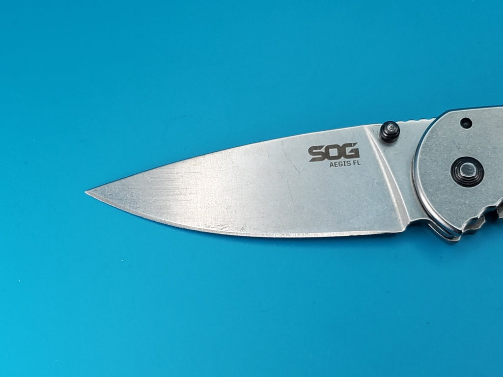 SOG Aegis FL Flipper Knife Frame Lock Plain Edge Blade!
