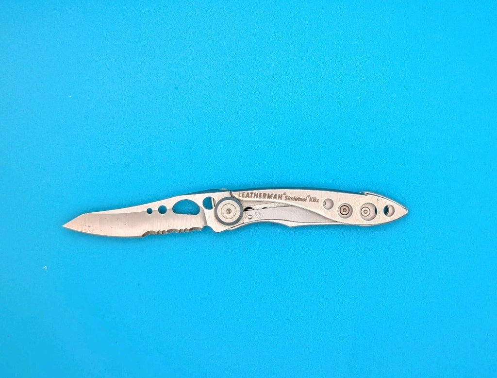 Leatherman Skeletool KBX Pocket Knife w/ Bottle Opener, SILVER!