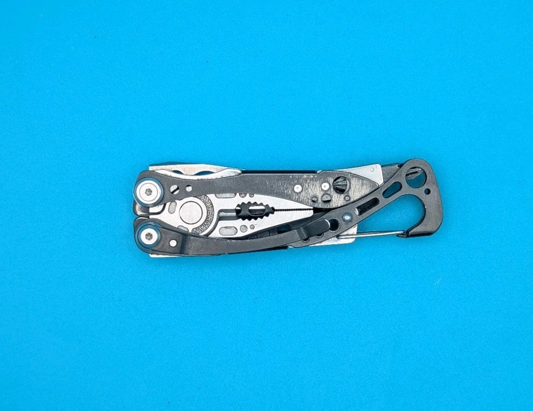 Leatherman Skeletool CX Multitool Plain Edge Knife!