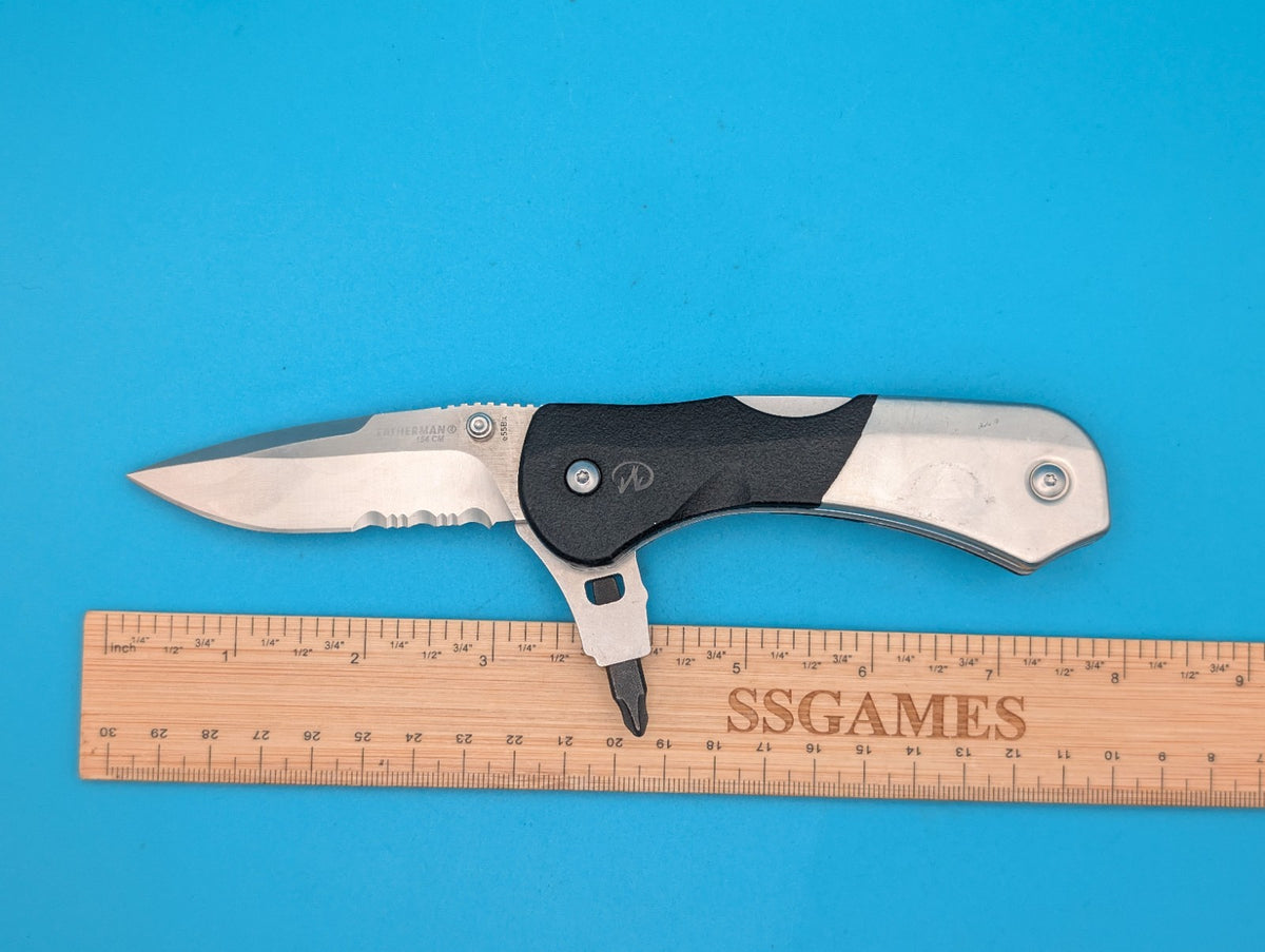 Retired Leatherman E55BX 154CM Blade Combo Edge Folding Pocket Knife!