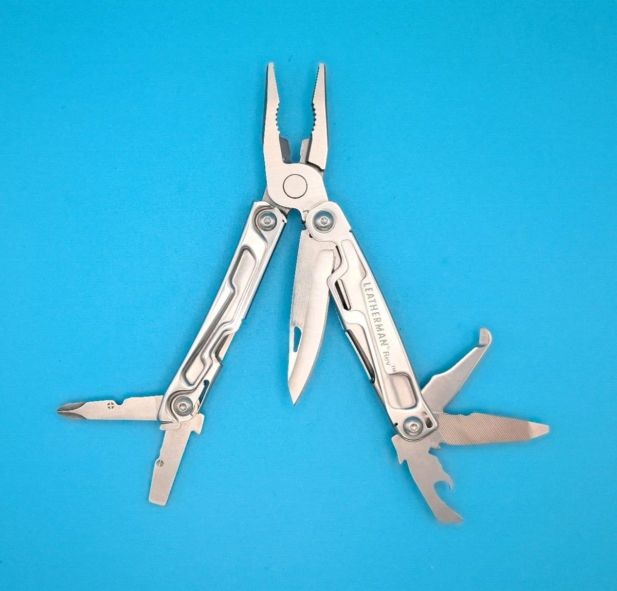 Leatherman Rev 3.8" Multi-Tool, Stainless!  With Sheath!