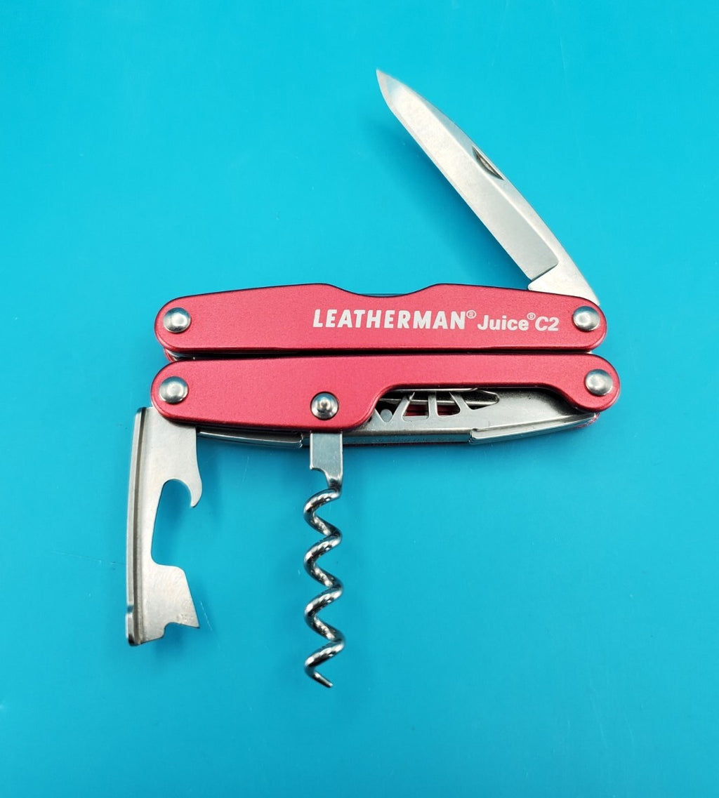 Leatherman Juice C2 Red Multi Tool! RETIRED! MINT! WITH LEATHER SHEATH!