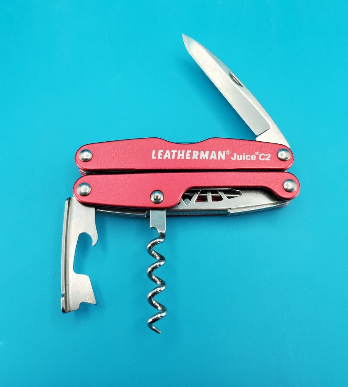 Leatherman Juice C2 Red Multi Tool! RETIRED! MINT! WITH LEATHER SHEATH!