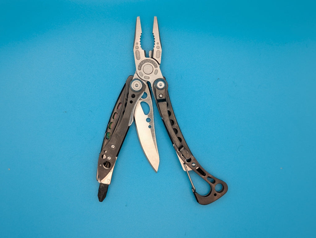 Leatherman Skeletool CX Multitool Plain Edge Knife!