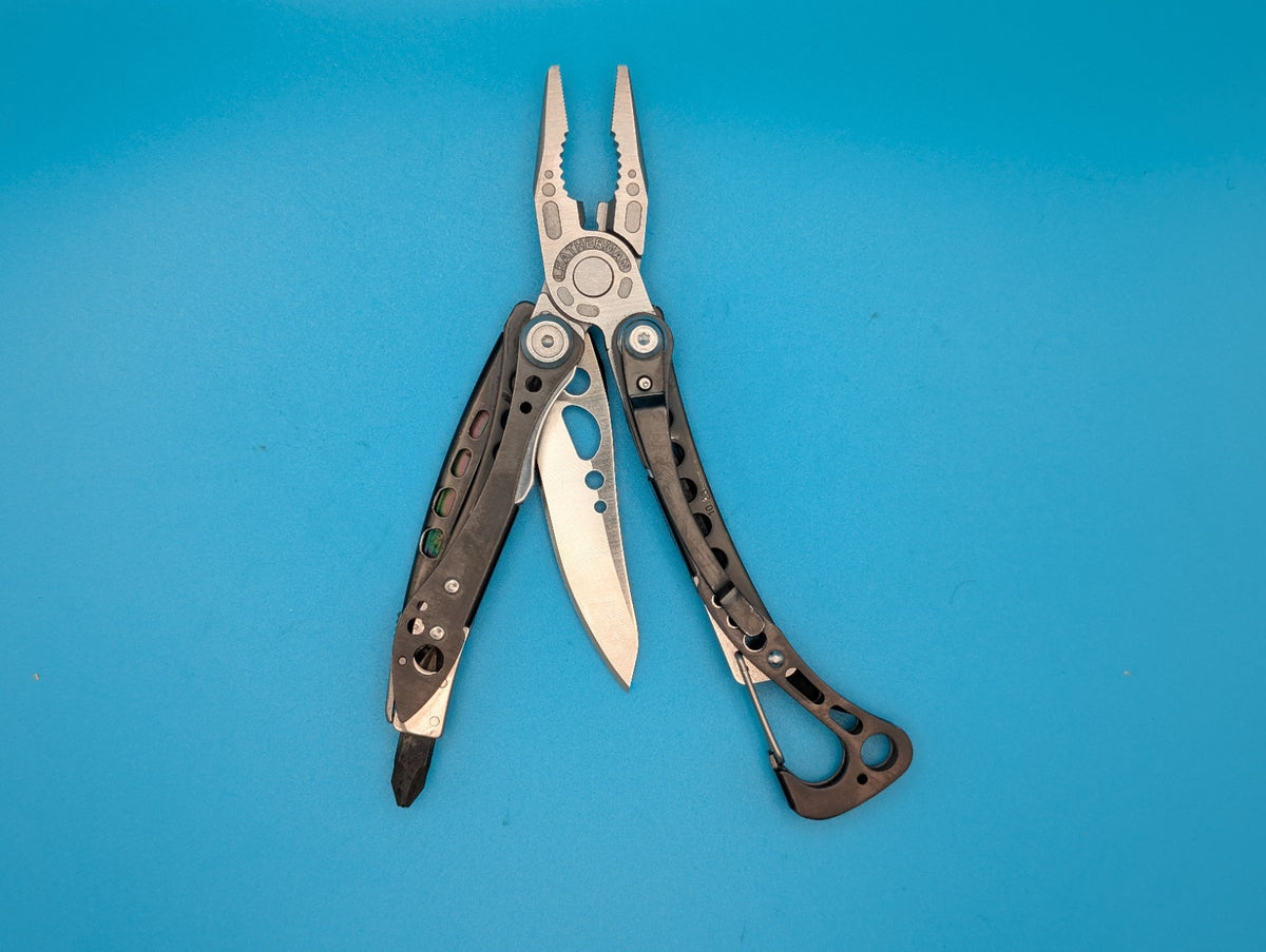 Leatherman Skeletool CX Multitool Plain Edge Knife!