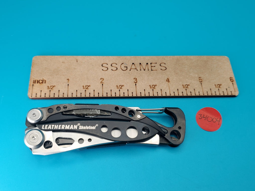 LEATHERMAN Skeletool Multi Tool - Combo Edge Blade Knife Pliers Carabiner!!!