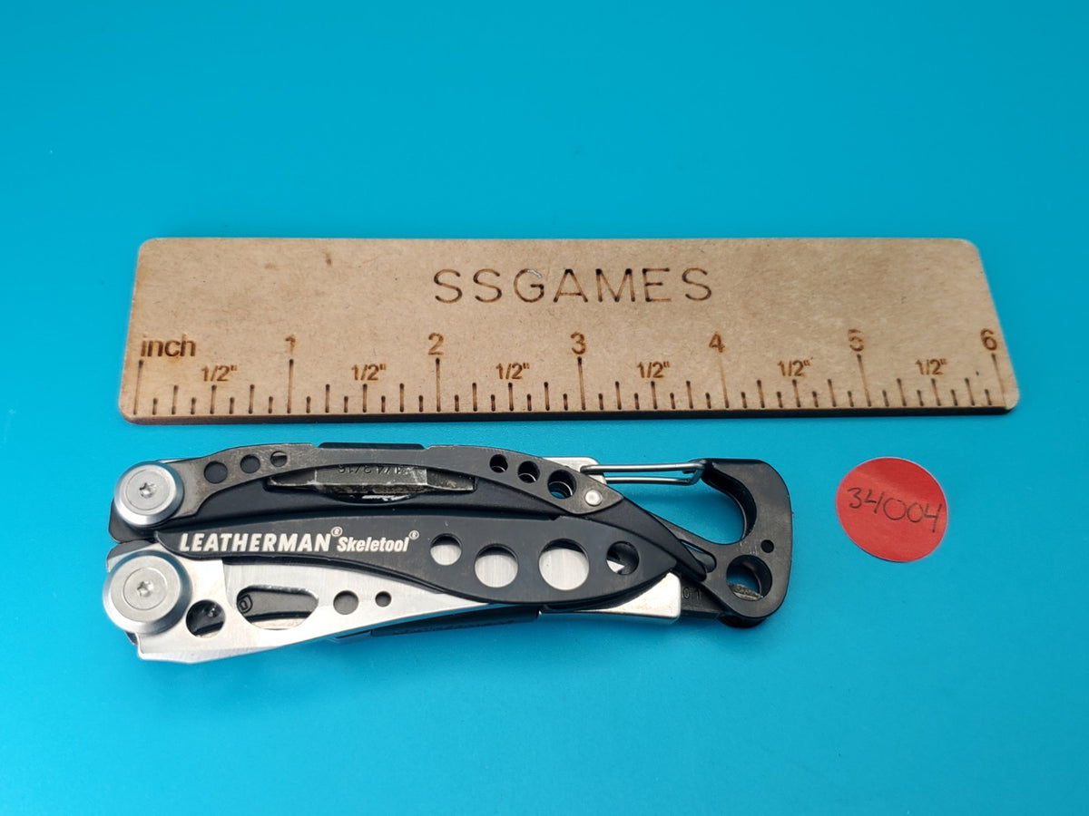 LEATHERMAN Skeletool Multi Tool - Combo Edge Blade Knife Pliers Carabiner!!!