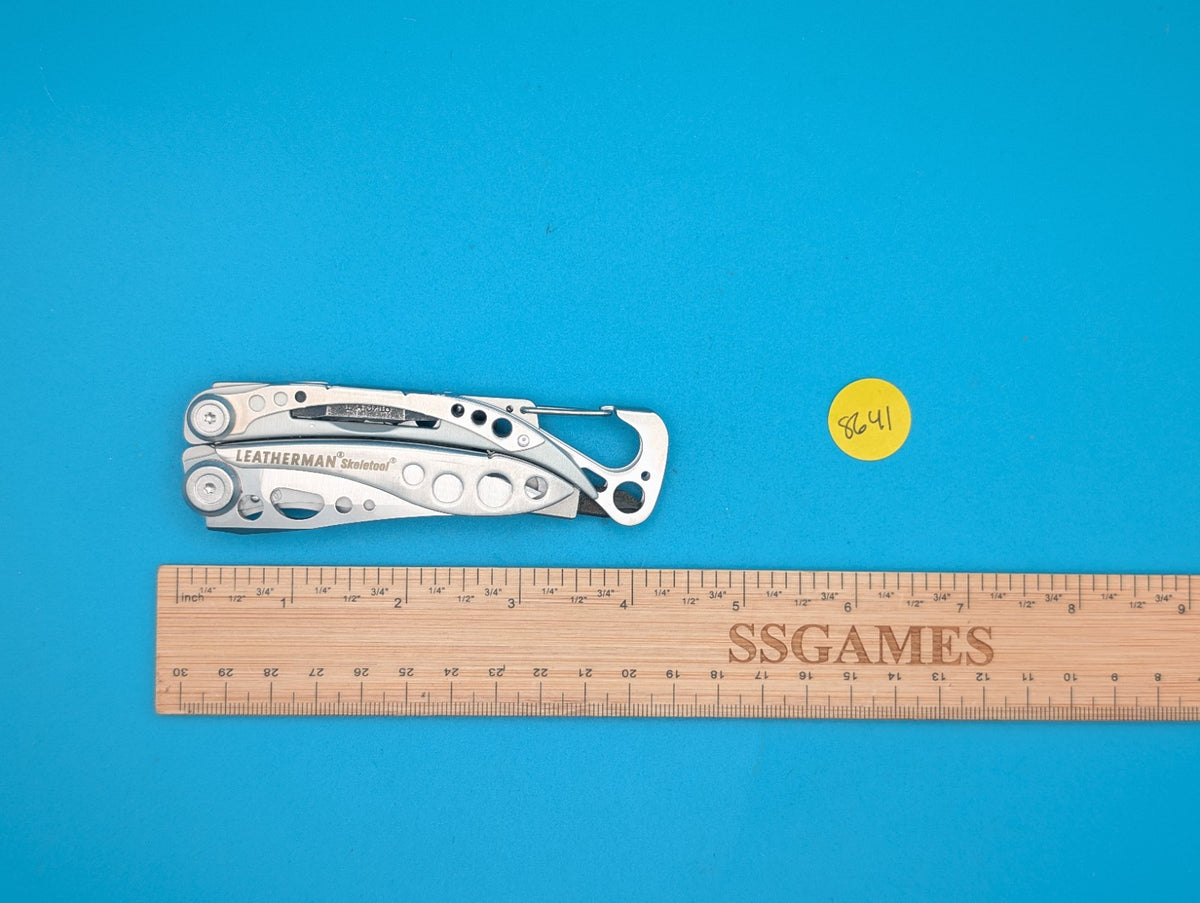 LEATHERMAN Skeletool Multi Tool - Combo Edge Blade Knife Pliers Carabiner!!!
