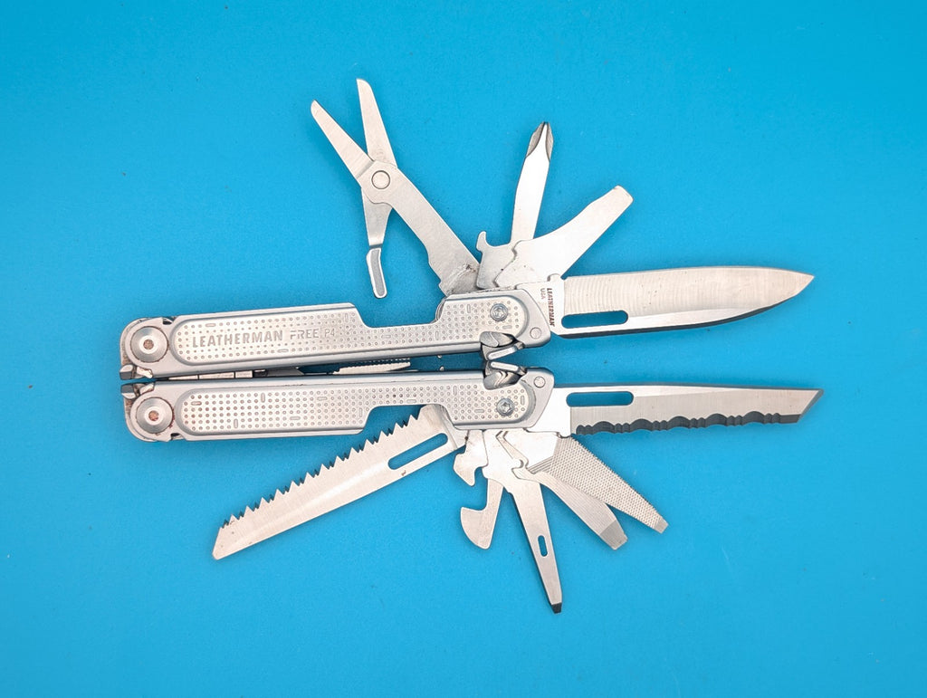 Leatherman Free P4 Multi-Tool! RETIRED! WITH SHEATH!