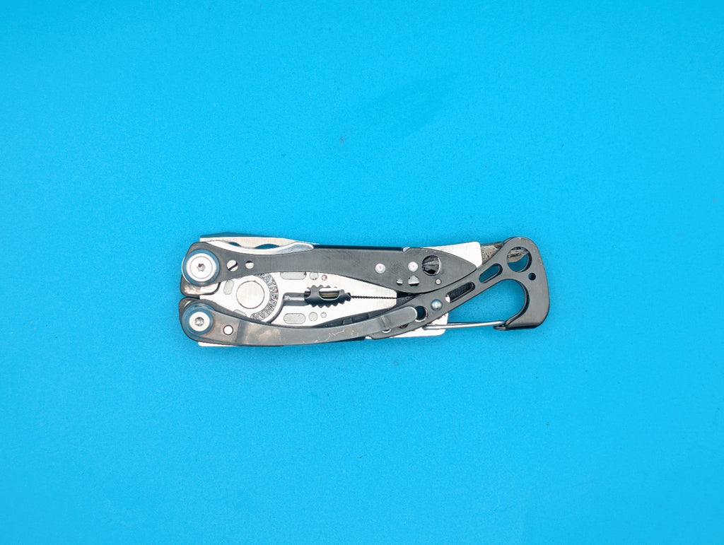 Leatherman Skeletool CX Multitool Plain Edge Knife!