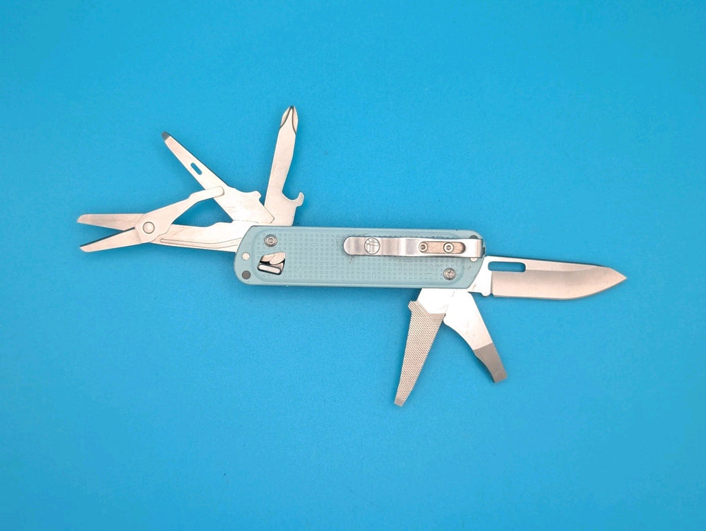 Leatherman FREE T4 Pocket Knife Multi-tool! Teal! RETIRED!