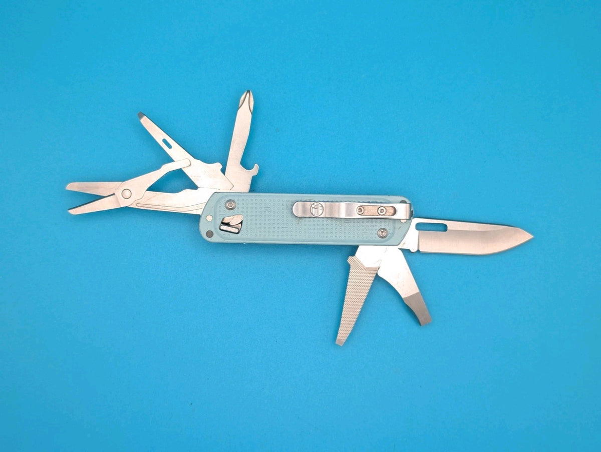Leatherman FREE T4 Pocket Knife Multi-tool! Teal! RETIRED!
